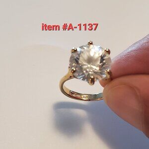 1 Gold Ring, item # A-1137, wt. 7 grams.